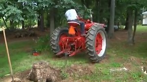44K views · 2.2K reactions | Red Tractor (Ronald Rousting a Stump) Farmall M Delight | Farmall Lovers | Facebook