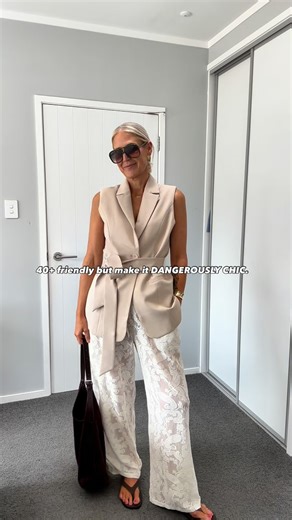 Hannah on Instagram: "How cool are these pants though?! 🤍 Because yes, we’re in our 40s… but we still want to look fabulous without trying too hard. Floaty lace, soft neutrals and a little dangerously-chic energy - obsessed.🤍✨ @featherandnoise Valerie pants - cream lace and Andie vest. @glassons tote (NZ) @numberoneshoesandhannahs Sascha jandals (ad) @valleyeyewear Bangs #desktodinner #styleover40 #workwearstyle #styleinspo #daytonightlook"