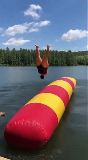 This inflatable water blob LAUNCHES them into the air! 😂 #WaterBlob #EpicLaunch #SummerFun