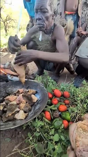 African Tribal Life – Cooking Fresh Bush Meat in the Jungle.