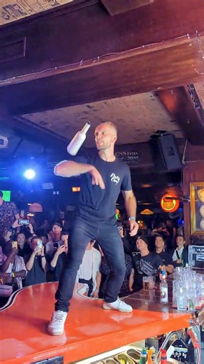 110K views · 1.2K reactions | Most consecutive bottle bumps on the elbow (cocktail flairing)  108 by Kristoff Vandenabeele  | Guinness World Records | Facebook