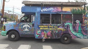 Mobile Art Bus providing activities to families as a therapeutic outlet