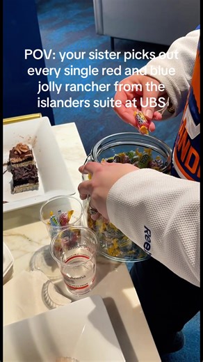 my favorite part is when she pours them all into her bag😂 #nyislanders #jollyranchers #hockeygame #funny #relatable @New York Islanders @nyislandersofficial @UBS Arena @Jolly Rancher