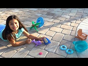 Playing with a toy Narwhal