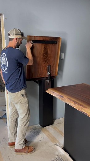 13K views · 395 reactions | We recently installed this 21’ live edge walnut bar top which was made using two 12’ long slabs and features a soft close damper assisted door! | Iron Timbers | Facebook