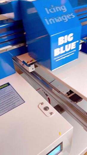 271K views · 113 reactions |  Halloween is in the air, and cookie demands are soaring! Let BLUE handle the rush, printing batches of cookies in minutes. ‍⬛  Want to learn more about our BLUE Printers that print directly on food? Visit our website (link in bio) We’ll see you there!  #BluePrinters #BigBlue #PrintOnFood #EdiblePrinter #PrintOnCookies #EdibleInk #HalloweenCookies #HalloweenFood #HalloweenCookieIdeas #IcingImages | Icing Images | Facebook