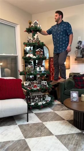 Ethan Dewhurst on Instagram: "LEGO Christmas display I wanted to incorporate the joy of the Christmas LEGO sets into our home’s holiday decorations. Does this display fit or is it out of place?? #lego #legodisplay #legoroom #legoafol #christmastreedecorating"