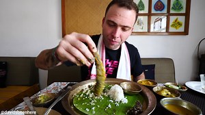 717K views · 1.4K shares | After starting my second day in Guwahati, India with an amazing street food tour, my local friend and I continued our exploration of this incredible city! Join us as we visit an 18th-century temple dedicated to the nine planets, hang out with some of the local monkeys, and try a fantastic Assamese thali that included dishes like pigeon curry, pitika, khar, and much more! Have you ever had an Indian thali? #DavidInIndia #Assam #India | davidsbeenhere.com | Facebook