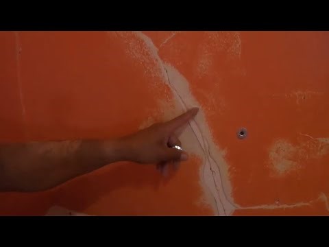 Using plaster washers to fix loose plaster walls