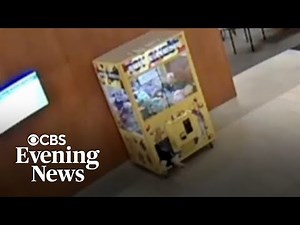 Child rescued after getting stuck in claw machine