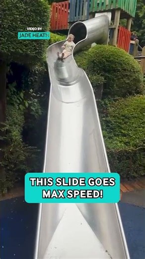 Hilarious Moment Kid Flies Down Wet Slide