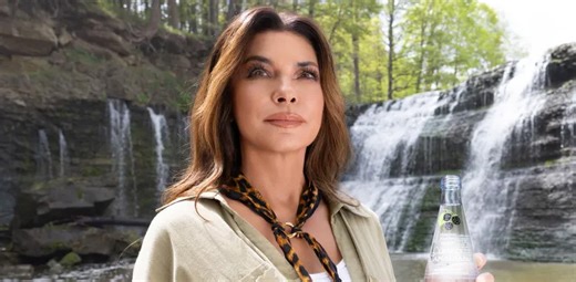 Shania Twain goes full action hero in comeback commercial video