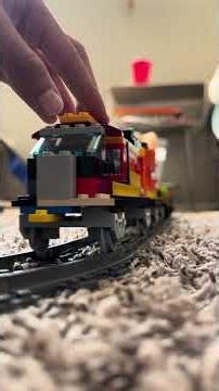 LEGO BNSF GP39M 2813 leads the YPHX1011 - 261 through Kingman, AZ