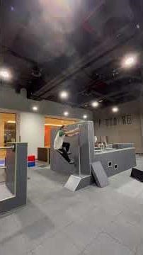 Mastering Parkour Challenges in an Indoor Obstacle Course