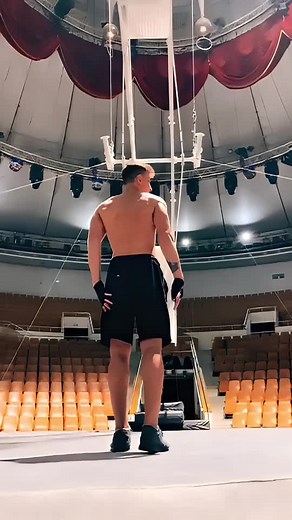Trampoline Stunt Performance in Indoor Arena