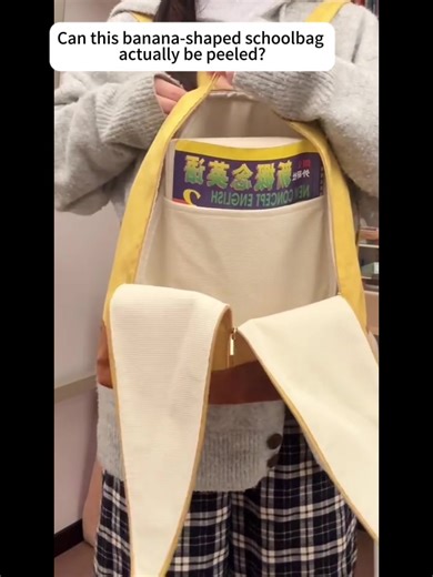 Banana backpack that actually peels! 🍌🎒 Carry your fun side everywhere you go. Unzip the peel, reveal the joy～ #PeelableBackpack #UniqueDesign #CuteFashion