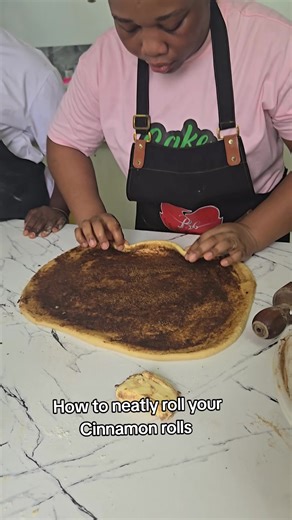Learn to Neatly Roll Cinnamon Rolls Today!