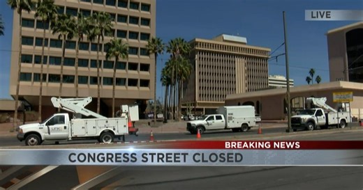 Emergency street closure in downtown Tucson due to damaged pole removal