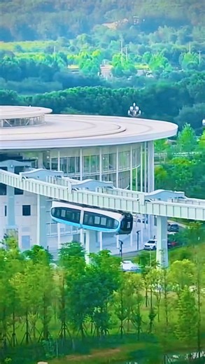 Dope China! 🇨🇳 on Instagram: "The Wuhan Skytrai is a the driverless elevated train system that operates on a 10.5-kilometer-long track with six stations, connecting key areas in the city’s Optics Valley. It operates from 8:00 a.m. to 8:00 p.m., with trains running at ten-minute intervals. It can reach speeds of up to 60 kilometers per hour (37 mph). Each train can carry up to 300 passengers. The project cost was around $1.8 billion USD and it began operation in 2023 #Wuhan #Skytrain #China #Ch