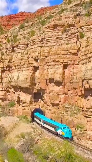 Hop aboard Verde Canyon Railroad for a four-hour round-trip journey through a stunning red rock Canyon where towering cliffs, the Verde River, wildlife, and wide-open skies create an experience you will never forget. Passengers enjoy luxurious, comfortable living room-style seating in vintage, climate-controlled rail cars on a century-old route. Relax inside with panoramic windows framing breathtaking Canyon views or step onto an open-air viewing car for an immersive, 360-degree perspective of t