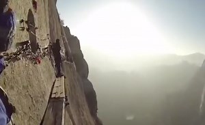 Cliffside Hike On Narrow Planks Tests Hiker’s Courage And Balance
