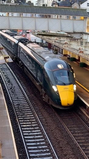 GWR class 802 accelerates under the old footbridge, Dawlish on the Exeter St David’s service 802001