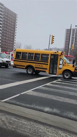 Busy Toronto Intersection at Midday — Everyday City Traffic in March