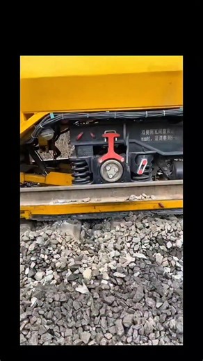 Real Engineerings | Engineering & Technology & Gadgets & DIY on Instagram: "This is how railways are built at speed! 💨 ​You are watching a highly advanced Track Construction Machine (TCM) effortlessly laying down the foundation for a new railway line. ​The Anatomy of a Railroad ​The Sleepers (0:06): The stacks of grey blocks on the flatbed wagons are Concrete Sleepers (or Railroad Ties). These are crucial for holding the steel rails in place and maintaining the correct gauge (width). ​The Robot