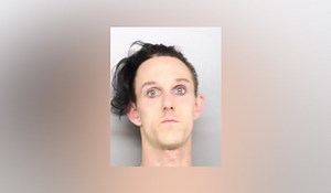 Man armed with pickax forces victim to ATM, court docs say