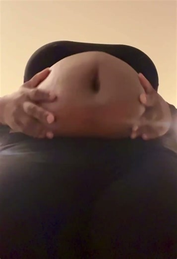 Watch as my belly morphs into different shapes as it jiggle in slow motion