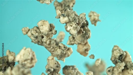 Super slow motion blue cheese pieces. Filmed on a high-speed camera at 1000 fps. High quality FullHD footage