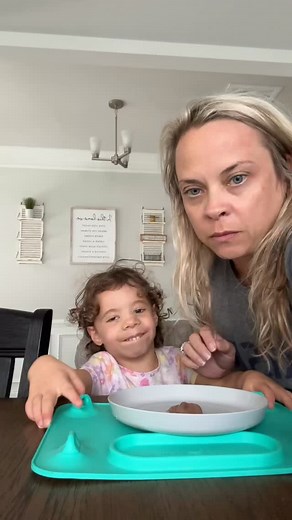 A few Kenna feeding updates: 1. She loves chocolate. #hermamasgirl 2. She has got to be going through a growth spurt because she is always signing “eat” I feel at some point, she may need inpatient intensive therapy—but 🤷‍♀️ | Kristen Wood