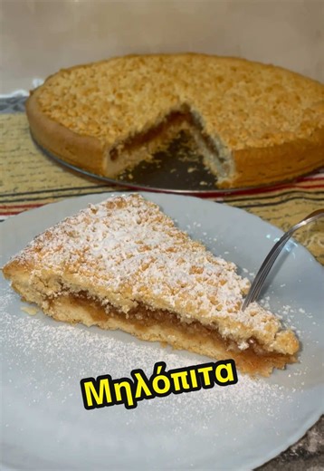 Συνταγή για τριφτή μηλόπιτα! Ψιχουλιαστή χειροποίητη ζύμη μπισκότου με γέμιση από μήλα και αρώματα κανέλας και λεμονιού! 👉Δείτε αναλυτικά τη συνταγή πατώντας στο λινκ στο προφίλ μου❤️ Υλικά Για Tη Zύμη: 500 γρ. Αλεύρι για όλες τις χρήσεις 10 γρ. Μπέικιν Πάουντερ 250 γρ. Βούτυρο 120 γρ. Ζάχαρη Άχνη 1 στικ Βανιλίνη 1 Αυγό 1 κουταλιά σούπας Νερό Για Τη Γέμιση 5 Μήλα (μέτρια) 1 κουταλάκι γλυκού Χυμό Λεμονιού 180 γρ. Ζάχαρη Κρυσταλλική 2 κουταλάκια γλυκού Κανέλα Ingredients For the Dough: 500 g Plai