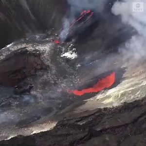 VIEW FROM ABOVE: Aerial footage shows lava continuing to flow into the roughly 1,640-foot-deep Halema’uma’u crater of the Kilauea volcano in Hawaii after it erupted on Sunday. https://abcn.ws/2WEWaju | ABC World News Tonight with David Muir