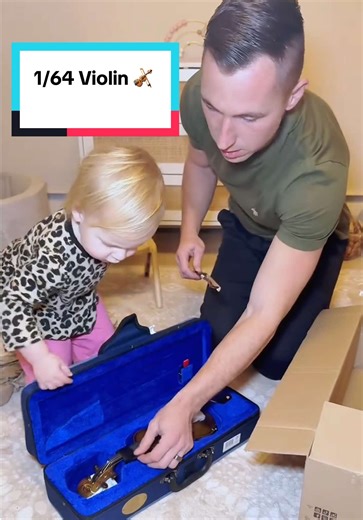 Daughter's Joy with the Smallest Violin