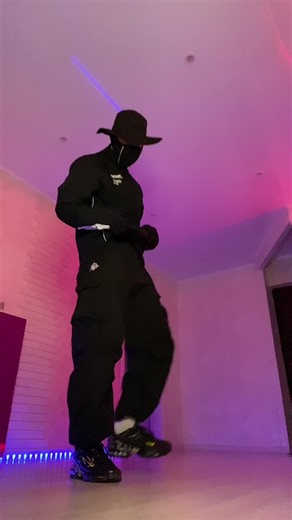 Dynamic Dance Routine in Modern Lighting Ambiance