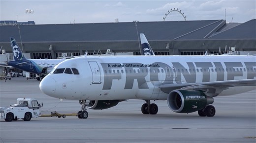 Close call between passenger jet, 2 trucks on tarmac at LAX