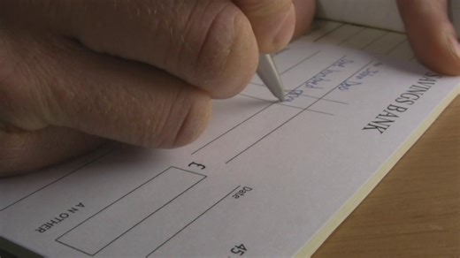 Federal Reserve considering winding down its check processing services