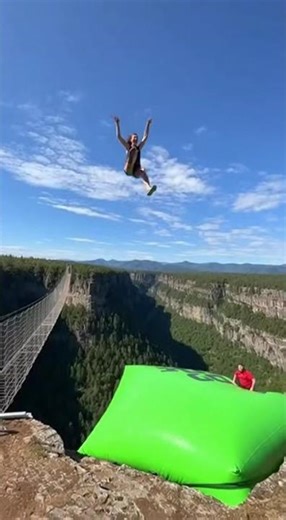Insane Cliff Jump onto a Giant Air Bag👾💥#ScaryRide #TravelWonderGuy