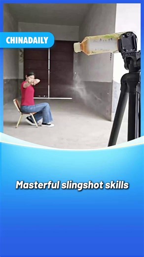 A woman demonstrates using a #slingshot, shooting through a water droplet and various unexpected objects! As long as there is a target, it can be hit precisely. #FunChina | China Daily