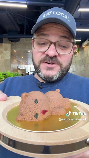 I am out at Mocha House in Rochester (located at 1381 Mt Hope Ave) to try their viral Sleeping Bear Chocolate Mousse. Mocha House recently opened and launched this sleeping bear dessert and I had to get there to ry it. So what is it besides just an adorable chocolate mousse bear? It’s literally just chocolate mousse shaped and decorated like a sleeping bear. It’s delicious and adorable. It’s here at a perfect time…when Starbucks is taking off with their plastic bear that you cannot find anywhere
