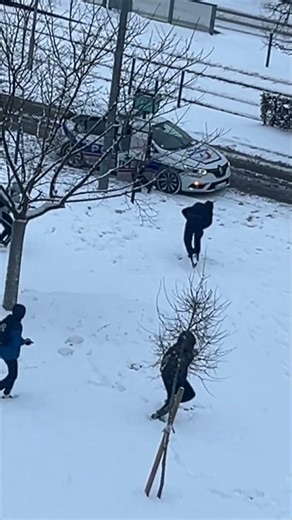 Police Join Youths for Spontaneous Snowball Fight