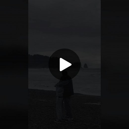 Romantic Beach Moments: Love Amidst Stormy Skies