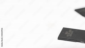 clips video 4k and full HD of memory SD card isolated on clean background this sd card for various computer, digital camera and smart mobile phone devices.