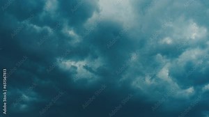 Atmospheric circulation is a set of air currents over the earth surface. Gray blue clouds. Puffy fluffy dark clouds. Cumulus cloud cloudscape slow motion. Autumn or winter. Nature weather forecast.