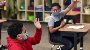 Amid COVID-19 surge, pediatrics association recommends in-school masks for all