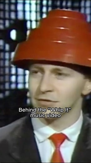 Gerald talks about the meaning behind the “Whip It” music video, straight from the source. | Devo