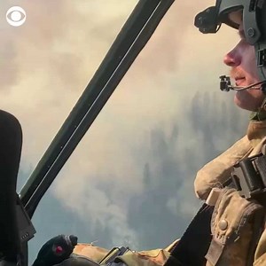 8.1K views · 105 reactions | Helicopter footage captures smoke filling the air as California’s Dixie Fire grew to over 91,000 acres on Wednesday. https://cbsn.ws/3Bon3eV | CBS News | Facebook