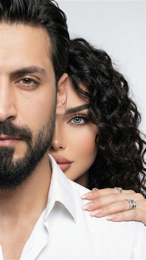 ‎آموزش ادیت | هوش مصنوعی | ترفند رشد‎ on Instagram‎: "📌فالوم کن تا ربات واست فعال بشه ✅ 📌کلمه (همدم) رو کامنت کن تا بطور خودکار پرامپت واست ارسال شه دایرکت ✅ متن پرامپت 👇🏻 با چهره ی عکس رفرنس، بدون کوچک ترین تغییری در مو ها و چهره، با این مشخصات بساز: Generate a hyper-realistic 8K vertical 9:16 close-up couple portrait. Use the uploaded reference image to match the man’s face and beard EXACTLY and the woman’s face + hair EXACTLY (same curly hairstyle, same hair color, same curl pattern; no c