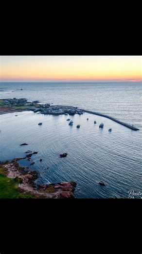 Little Compton, RI. Sakonnet Harbor in Little Compton feels like a place that never lost its rhythm with the sea. For generations it has been a working harbor, home to lobstermen and small fishing boats, not just pleasure craft, which gives it an authentic, lived-in character. On calm mornings you can still see traps stacked along the docks and boats heading out at sunrise, much like they have for over a century. It is a reminder that this quiet corner of Rhode Island remains deeply tied to its 